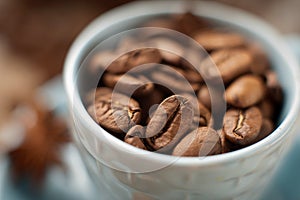 Coffee beans in a cup