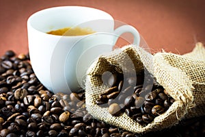 Coffee beans and cup
