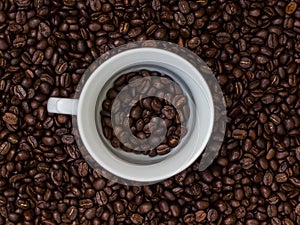 Coffee beans in a cup,cup of coffee with beans