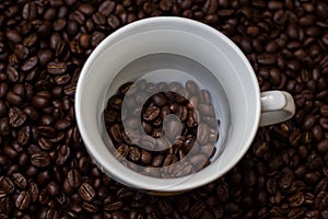 Coffee beans in a cup,cup of coffee with beans