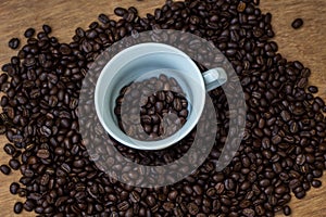 Coffee beans in a cup,cup of coffee with beans