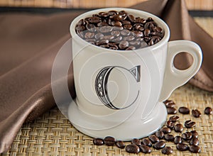 Coffee beans in a cup