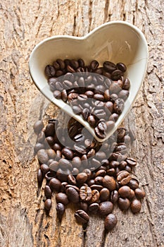 Coffee beans in a cup heart