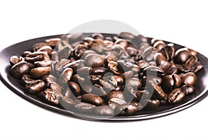 Coffee beans in the dish
