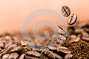 Coffee beans falling on pile