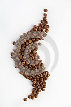 Coffee beans in the form of steam, top view isolated on white background.