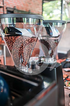 Coffee beans in the glass jar at cafe