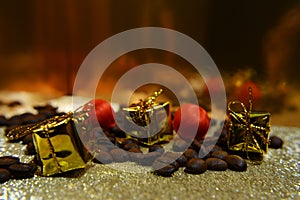 Coffee beans gold gift boxes on gold blur background