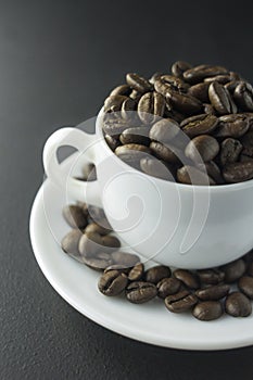 Coffee beans ground coffee and cup of black coffee