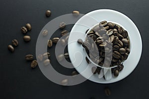 Coffee beans ground coffee and cup of black coffee