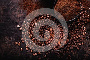 Coffee beans, ground coffee and instant coffee on a dark background