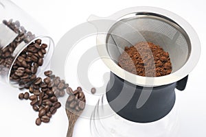 Coffee Beans And Ground Coffee on white background