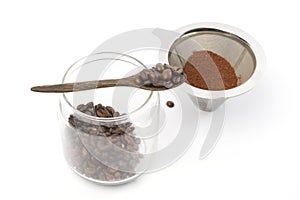 Coffee Beans And Ground Coffee on white background