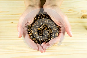 Coffee beans in hands