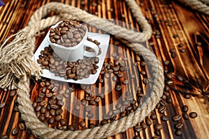 Coffee beans inside square espresso cup