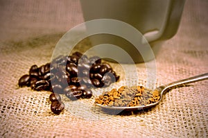 Coffee beans and instant coffee and mug