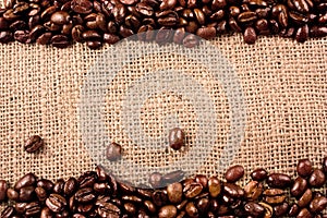 Coffee beans on a jute background