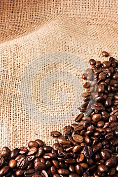 Coffee beans on a jute background