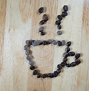 Coffee beans make into coffee cup shape