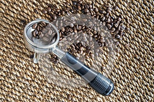 coffee beans, portfilter, and water hyacinth wickerwork background