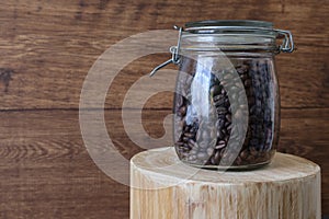 Coffee beans preserved in a glass bottle.