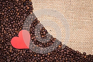 Coffee beans with red heart and gunny textile