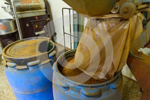 Coffee beans during the roasting process. Drum type roaster. Rosting process of coffee