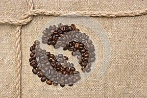Coffee beans and rope knot