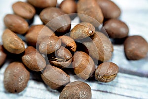 coffee beans, seeds of the Coffea plant and the source for coffee. It is the pip inside the red or purple fruit often referred to