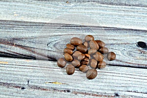 coffee beans, seeds of the Coffea plant and the source for coffee. It is the pip inside the red or purple fruit often referred to