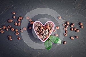 Coffee beans in the shape of a heart.