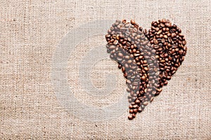 Coffee beans in shape of heart. Happy Valentine Day