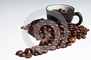 Coffee beans shaped like south america and black c