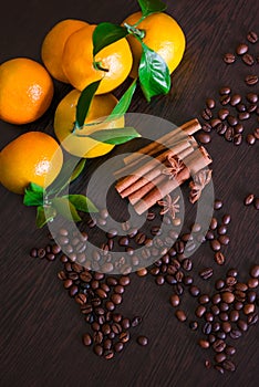 Coffee beans with spices on the old wooden boards. , cinnamon, nuts, star anise