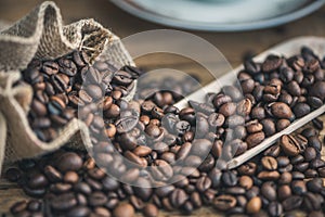 Coffee Beans Spilled out of Burlap Sack