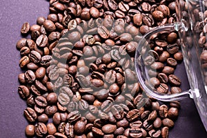 Coffee beans spitted out from cup.