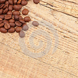 Coffee beans spread over table - close up shot