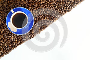 coffee beans stripes isolated in white background. Frame with coffee beans and blue coffee cup