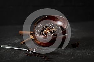 Coffee beans on table. Wooden desk. dark background.