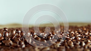 Coffee Beans Take Off From the Heap. Slow Motion