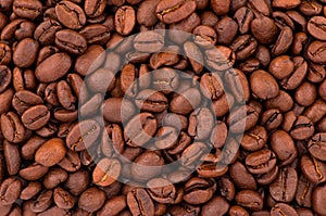 Coffee beans texture. The toasted fragrant grain