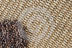 Coffee beans and water hyacinth wickerwork background