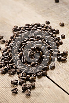 Coffee beans on wood board