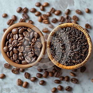 Coffee beans in a wooden bowls on a marble background.