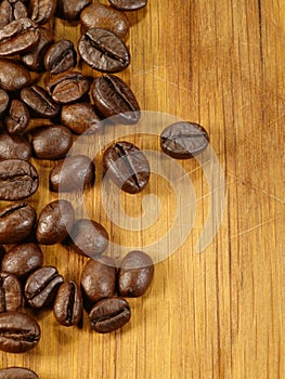 Coffee beans on the wooden desk