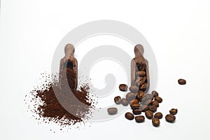 Coffee beans in a wooden scoop isolated on a white background. Roasted coffee beans isolated. A wooden scoop with coffee.