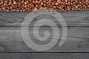 Coffee beans on wooden table template and background
