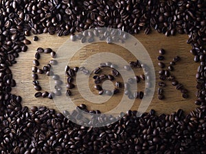 Coffee beans and the word break spelled with the coffee beans