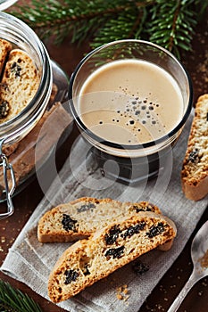 Coffee with biscotti or cantucci on wooden vintage table, traditional Italian biscuit