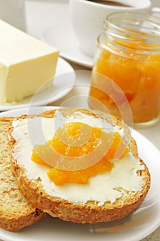 Coffee, bread, butter and jam